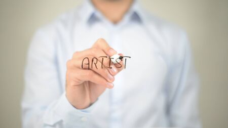 Artist , man writing on transparent screenの写真素材