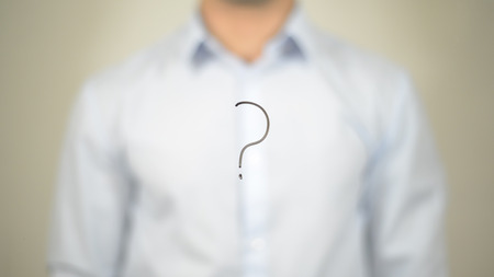 Question Mark Sign, man writing on transparent screenの写真素材