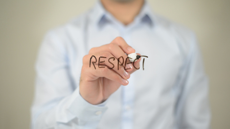 Respect, man writing on transparent screenの写真素材