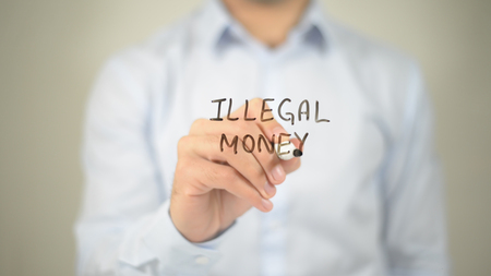 Illegal Money , man writing on transparent screenの写真素材