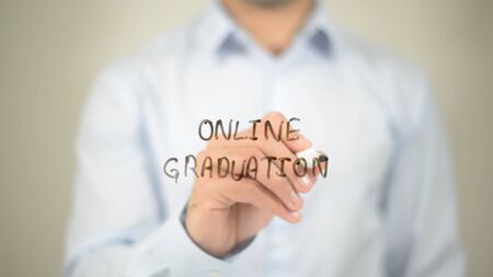 Online Graduation, writing on transparent screenの写真素材