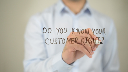 Do You Know Your Customer Right ? man writing on transparent screenの写真素材