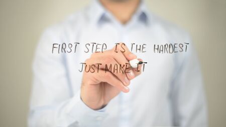 First Step is the Hardest, Just Make it, man writing on transparent screenの写真素材