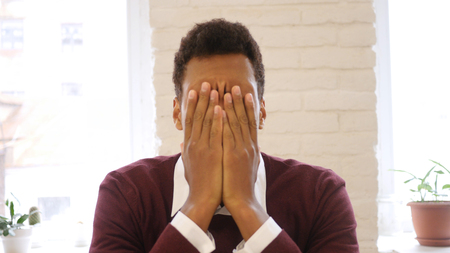 Frustrated Tired, stressed, tense man at Workの写真素材