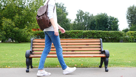 Man Walking in Park,  Coming to Sit on Bench, Red Hairs