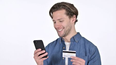 Online Payment on Smartphone by Young Man on White Backgroundの写真素材