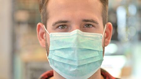 Close up of Man with Protective Face Maskの写真素材