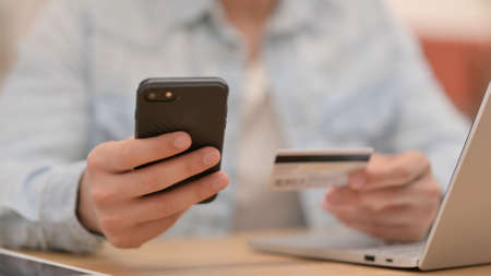 Online Shopping on Smartphone by Male Hands, Close upの写真素材