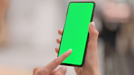 Close Up of Finger Lcicking on Smartphone with Green Screen