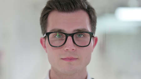 Close up of Face of Serious Young Man