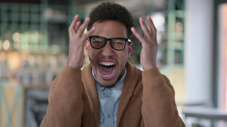 Portrait of African Man Shouting, Screamingの写真素材