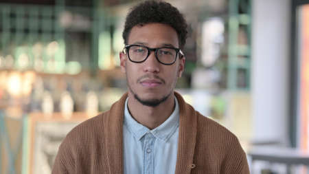 Portrait of African Man Looking at Cameraの写真素材