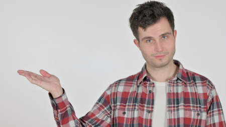 Portrait of Young Man Holding Product in Hand