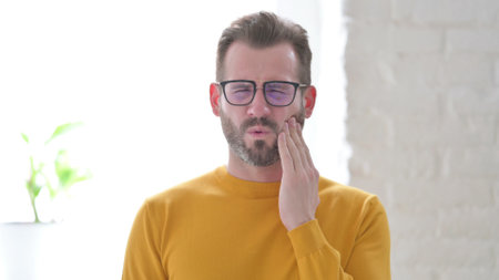 Portrait of Sick Man having Toothacheの写真素材