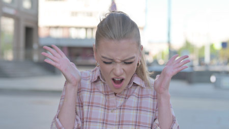 Portrait of Angry Young Woman Fighting Outdoor