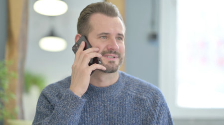Mature Adult Man Talking on Phone