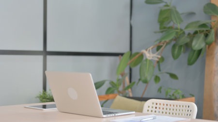 Young African Man Leaving Office after Workの写真素材