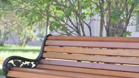 Young African Man Coming, Sitting on Benchの写真素材