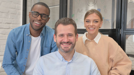 Portrait of Smiling Multi Ethnic Teammates in Office