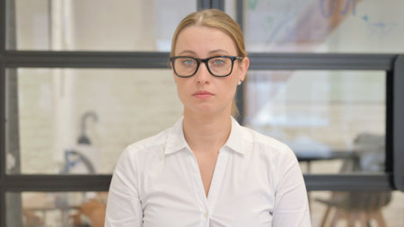 Portrait of Serious Mature Business Woman in Officeの写真素材