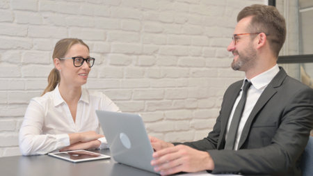 Business People Discussing Work in Officeの写真素材