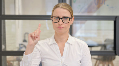 Portrait of Tense Mature Business Woman in Denialの写真素材