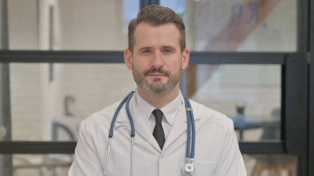 Portrait of Serious Middle Aged Doctorの写真素材