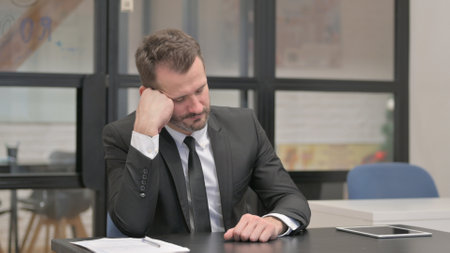 Tired Businessman at Work, Relaxingの写真素材