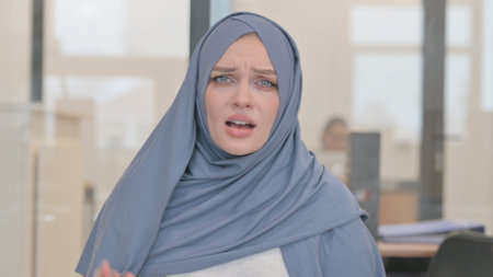 Portrait of Arab Woman in Hijab, Video Chatの写真素材