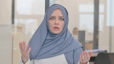 Portrait of Arab Woman Reacting to Failureの写真素材
