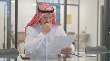 Man Shocked after Reading Documentsの写真素材