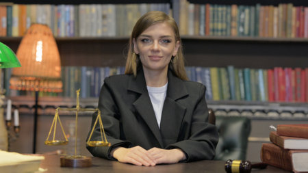 Approval Gesture by Female Lawyer in Officeの写真素材