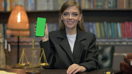 Female Lawyer Showing Smartphone with Chroma Key Screen