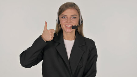 Portrait of Businesswoman with Thumbs Up on White Backgroundの写真素材