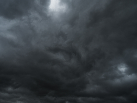 Storm and rain clouds in dark sky nature background