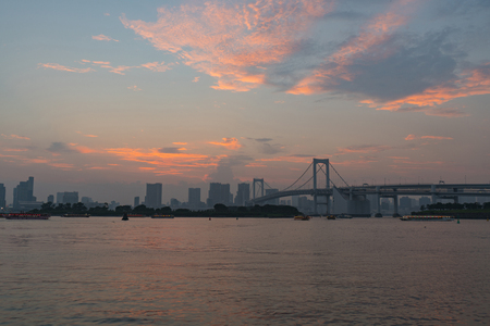 Tokyo city at sunrise and clouds background.の写真素材