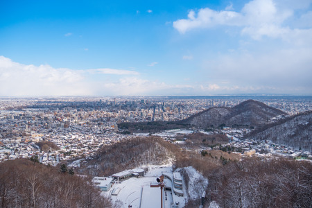 Snow covers town in winter from top viewの写真素材