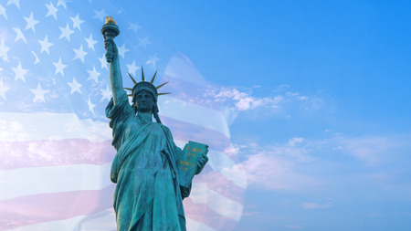 Double exposure image of American flag and statue of liberty.の写真素材