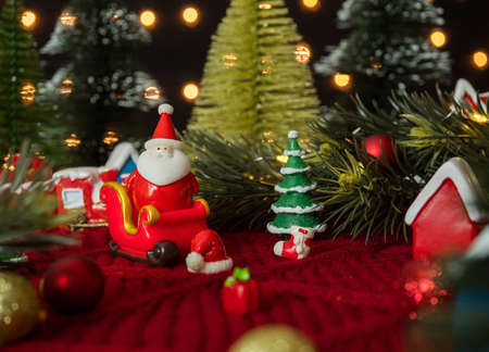 Santa claus on sleigh ride and various decor for christmas and new year concept.の写真素材