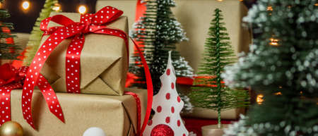 New year or christmas gift box with christmas tree for festival holiday background.の写真素材