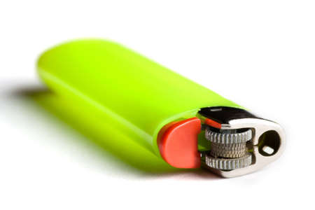 A close-up of a green lighterの写真素材