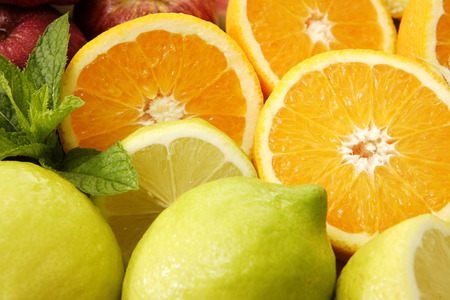 A collection of an assortment of tropical fruits on an isolated white backgroundの写真素材