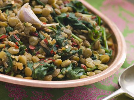 Lentils with spinach and Garlicの写真素材
