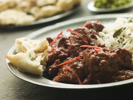 Pewter Plate With Meat Phall Fragrant Basmati and Naanの写真素材