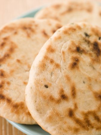 Plate of Plain Naan Breadsの写真素材