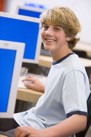 Male student in computer classの写真素材