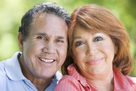 Couple outdoors smilingの写真素材