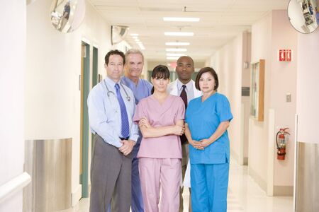 Hospital Team Standing In A Corridorの写真素材