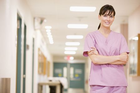Nurse Standing In A Hospital Corridorの写真素材