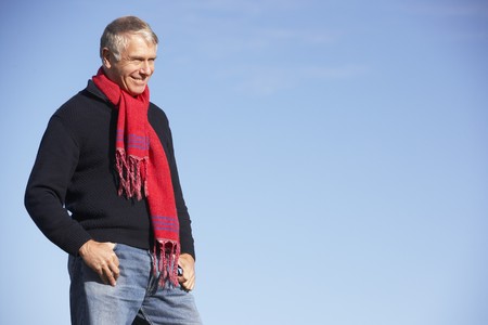 Senior Man Standing In Parkの写真素材